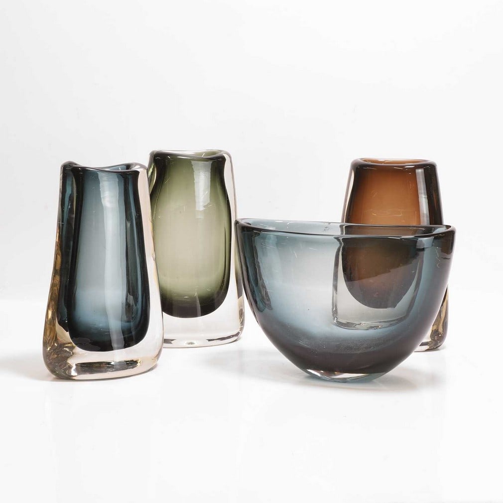 Geoffrey Baxter (1922-1995) for Whitefriars Three '9651' vases: Geoffrey Baxter (1922-1995) for Whitefriars Three '9651' vases Glass, c.1960, in Willow, Indigo, and Cinnamon, together with a 9659 bowl, in Indigo (the vases 24cm high each, the bowl 17.5cm high) (4)