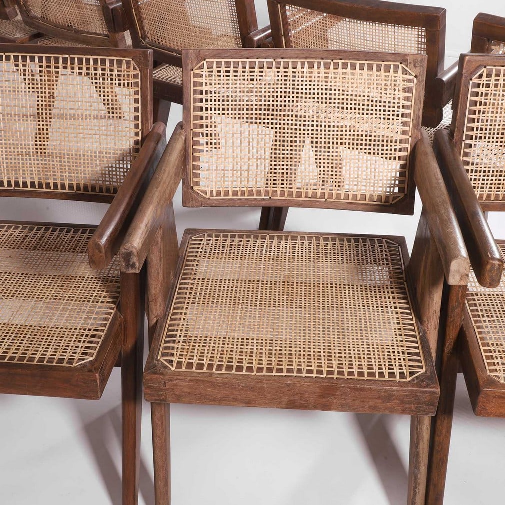 Pierre Jeanneret (Swiss, 1896-1967) A set of twelve chairs - 12