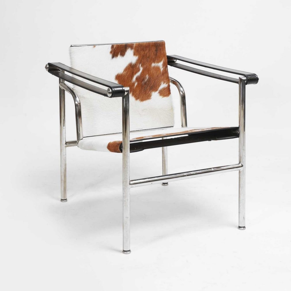 After Charles-Édouard Jeanneret aka 'Le Corbusier' (Swiss-French, 1887-1965) An 'LC1' style: After Charles-Édouard Jeanneret aka 'Le Corbusier' (Swiss-French, 1887-1965) An 'LC1' style armchair Also known as a 'fauteuil à dossier basculant' model armchair, originally designed in