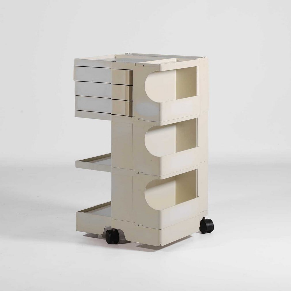 Cesare 'Joe' Colombo (Italian, 1930-1971) A white plastic 'Boby' trolley: Cesare 'Joe' Colombo (Italian, 1930-1971) A white plastic 'Boby' trolley c.1960s, with two pivot drawers over two shelves to the left, with a further three shelves to the right, and two storage