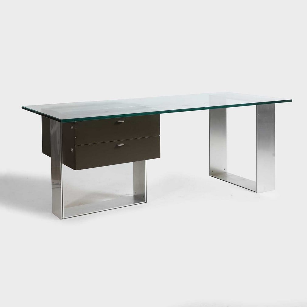 Behr International An architect's desk: Behr International An architect's desk c.1960s, the rectangle glass top over two brushed aluminium rectangle bases, one with a bank of two grey drawers, with applied manufactuer's label (180cm wide, 8