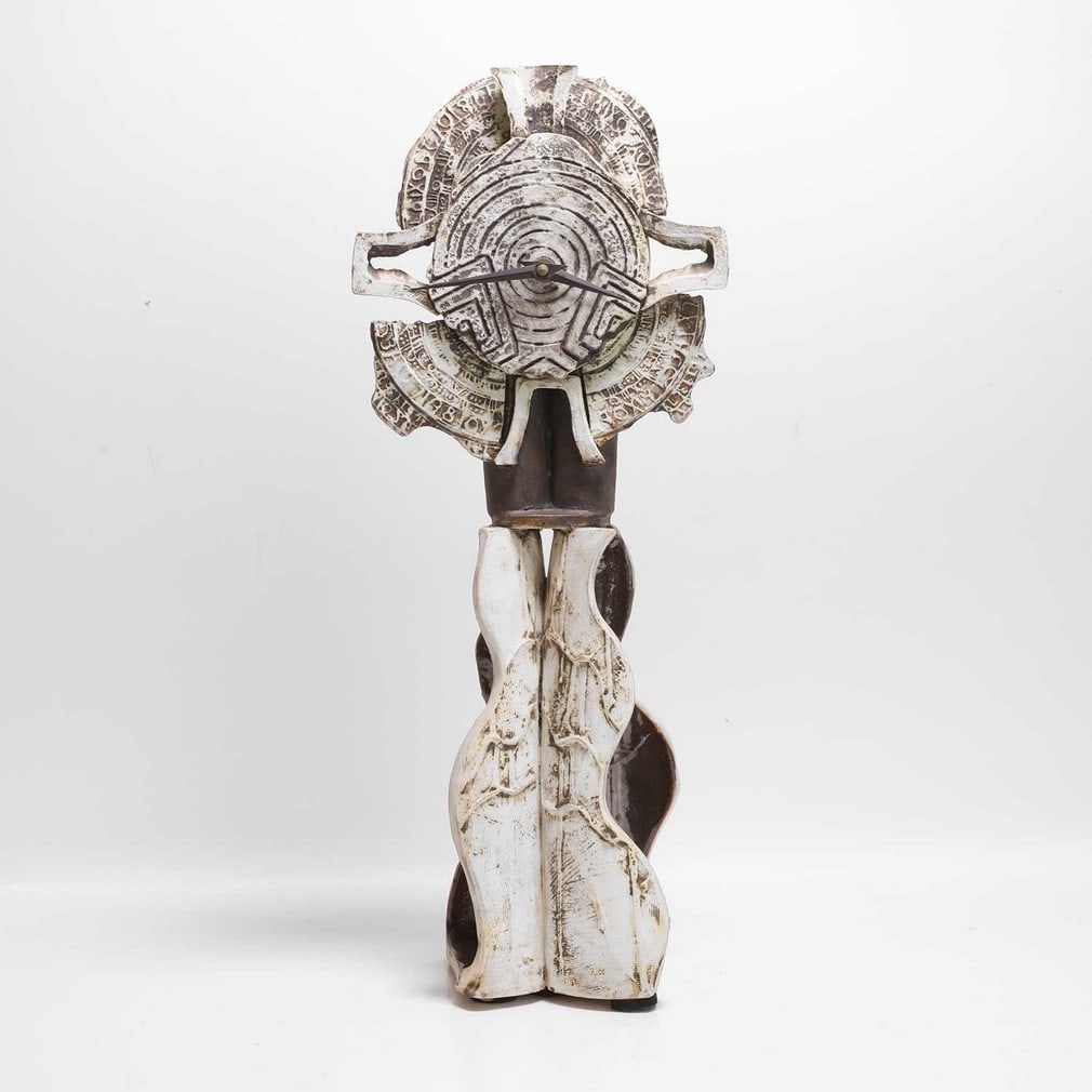 ▲ Bernard Rooke (b.1938) A stoneware high-fired earthenware clock: ▲ Bernard Rooke (b.1938) A stoneware high-fired earthenware clock 1999, with incised decoration, incised initials, together with a certificate of authenticity (21cm wide, 13cm deep, 52