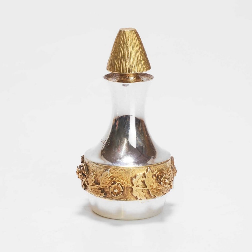 ▲ Christopher Nigel Lawrence (b.1936) A silver and silver-gilt scent bottle (1 of 3)