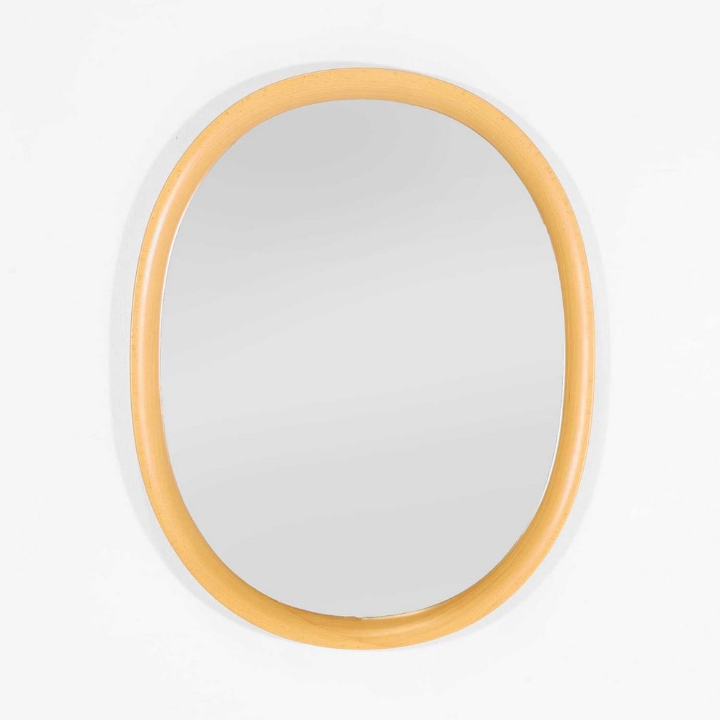 Sori Yanagi (Japanese, 1915-2011) A small mirror: Sori Yanagi (Japanese, 1915-2011) A small mirror c.1975, beechwood, manufactured by Akita Mokko, with applied manufacturer's label (47.5cm wide, 3cm deep, 59.5cm high) Footnote: Literature: Forms