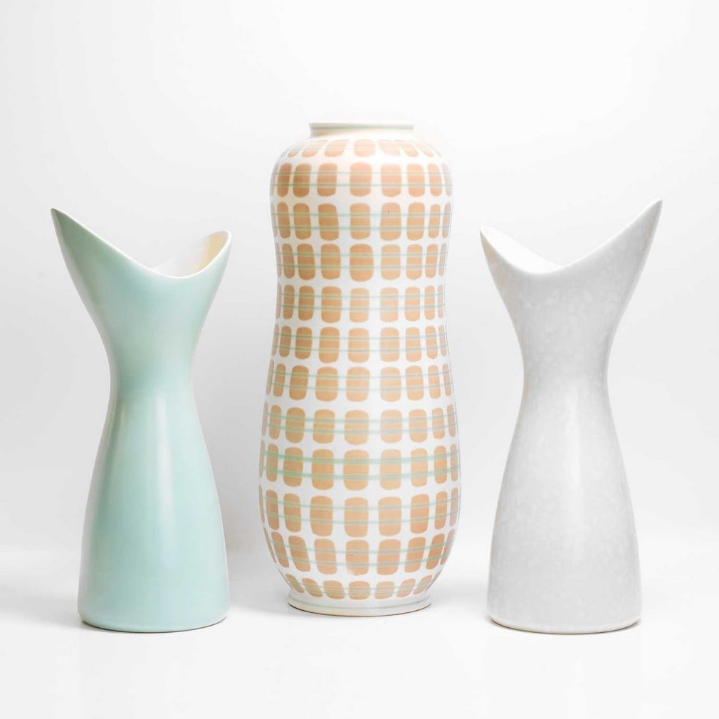 Poole Pottery Three vases: Poole Pottery Three vases Comprising a large 'Freeform' hand-thrown waisted earthenware vase, designed by Alfred Read, pattern no. X/PQB, printed and inscribed, incised '702', two 'Freeform' vases, pr