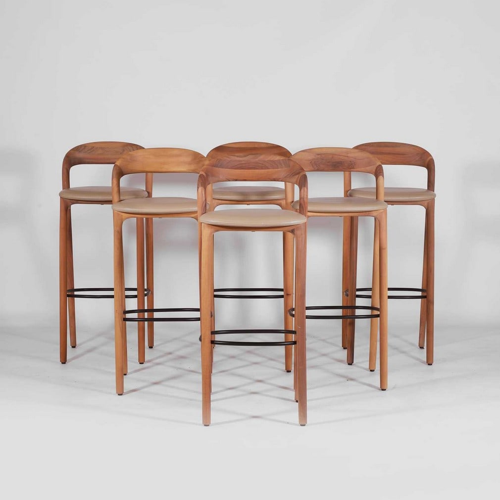 Artisan A set of six 'Neva' bar stools: Artisan A set of six 'Neva' bar stools Of recent manufacture, the oak ribbon backs, with taupe grained leather seats, raised on four legs united by a black painted metal foot rest, each with applied