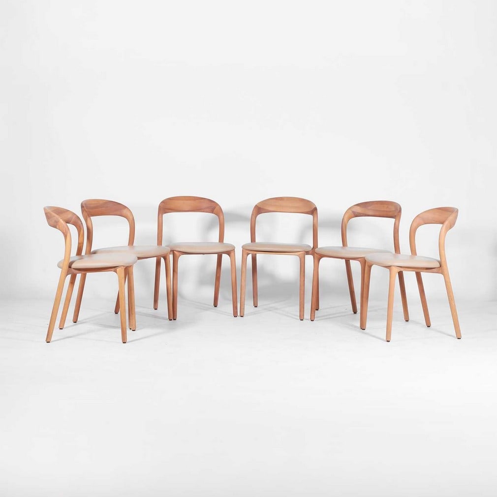 Artisan A set of six 'Neva Light' dining chairs: Artisan A set of six 'Neva Light' dining chairs Of recent manufacture, the oak frame with leather upholstery, each with applied manufacturer's label (46cm wide, 50cm deep, 80cm high, seat