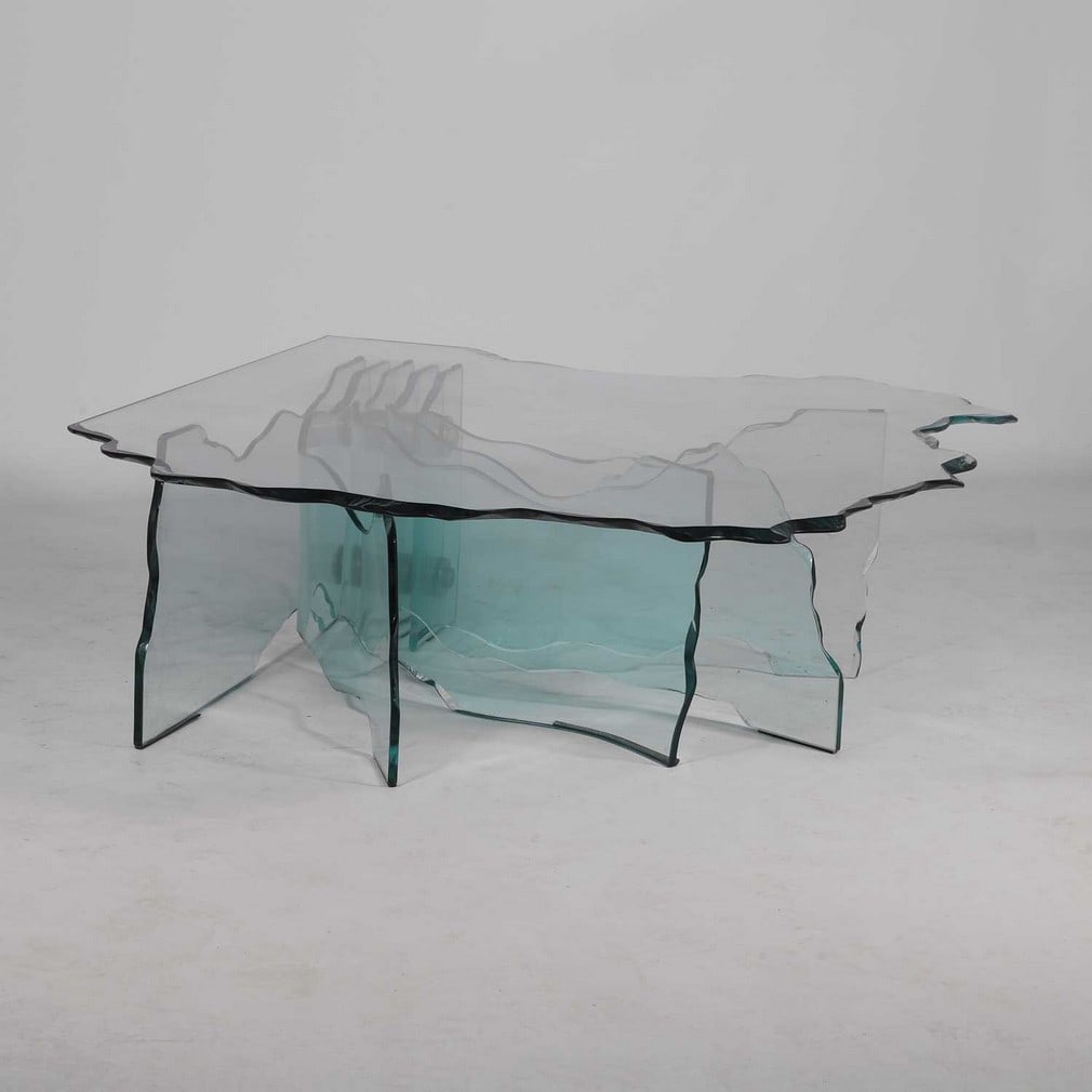 Danny Lane (American, b.1955-) for Fiam A glass 'Shell' coffee table: Danny Lane (American, b.1955-) for Fiam A glass 'Shell' coffee table 1990s, glass and stainless steel, marked to base (122cm wide, 112cm deep, 40cm high)