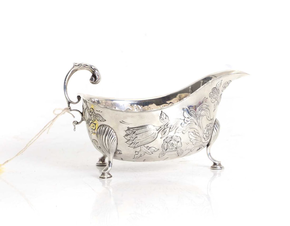 A silver sauce boat - 2