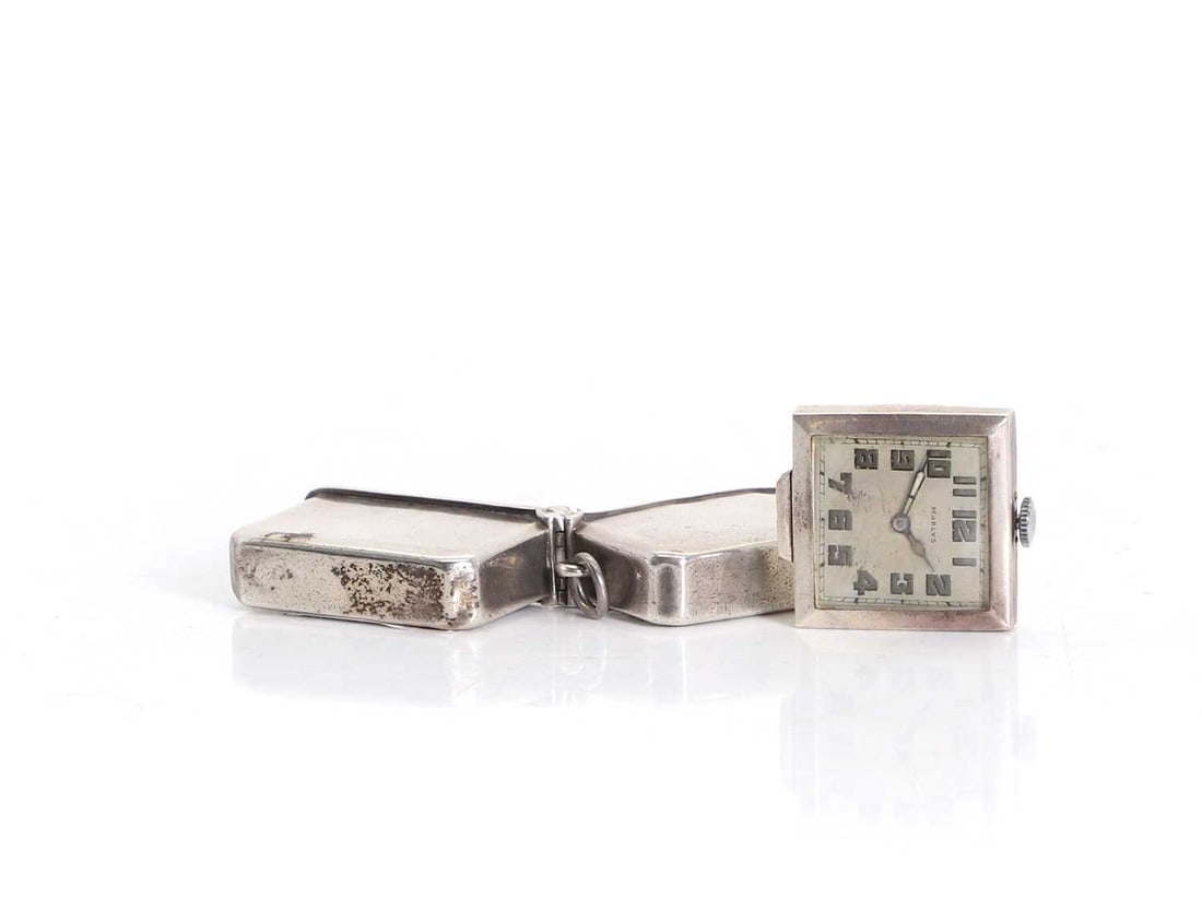 A small silver cased travel clock Circa 1930 (1 of 1)