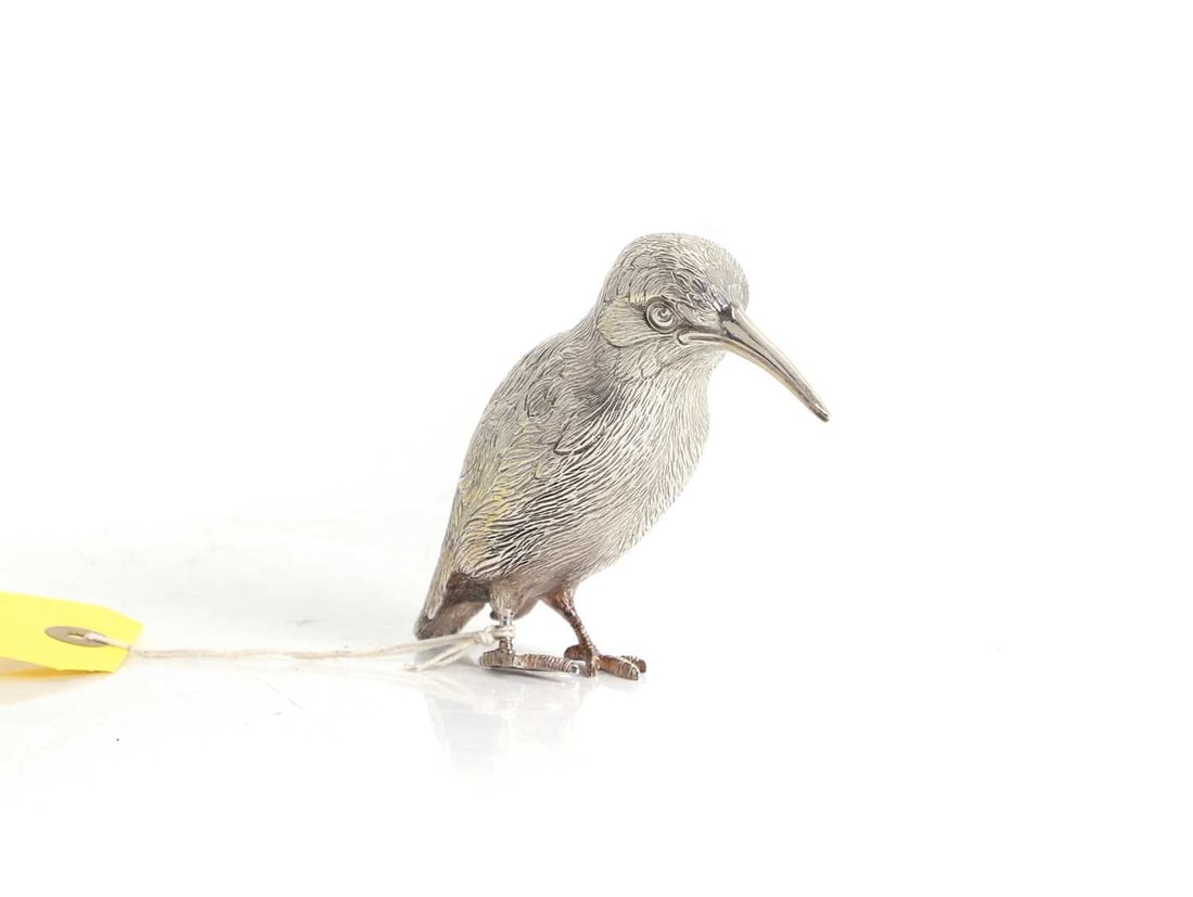 A silver table figure modelled as a Kingfisher 20th century: A silver table figure modelled as a Kingfisher 20th century By C J Vander Ltd, Sheffield, 1996, modelled standing 14cm wide, 9.5cm high, 14.3ozt Condition Report: Sits with a slight wobble. Some