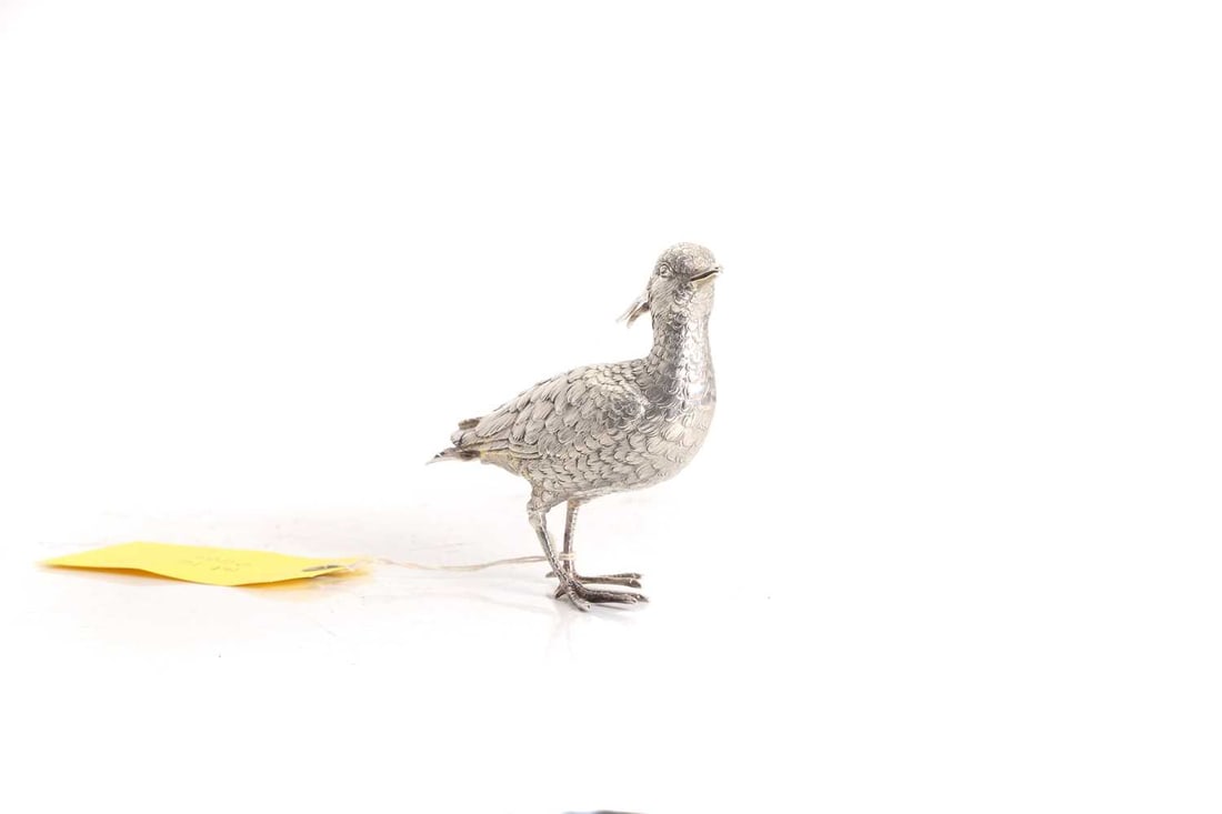 A silver novelty pepper caster modelled as a Curlew (1 of 2)
