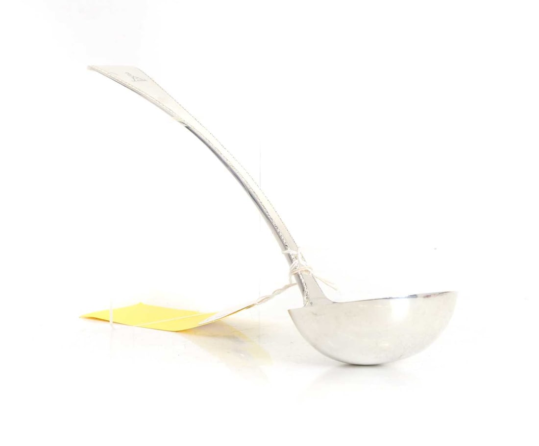 A silver punch ladle (1 of 2)