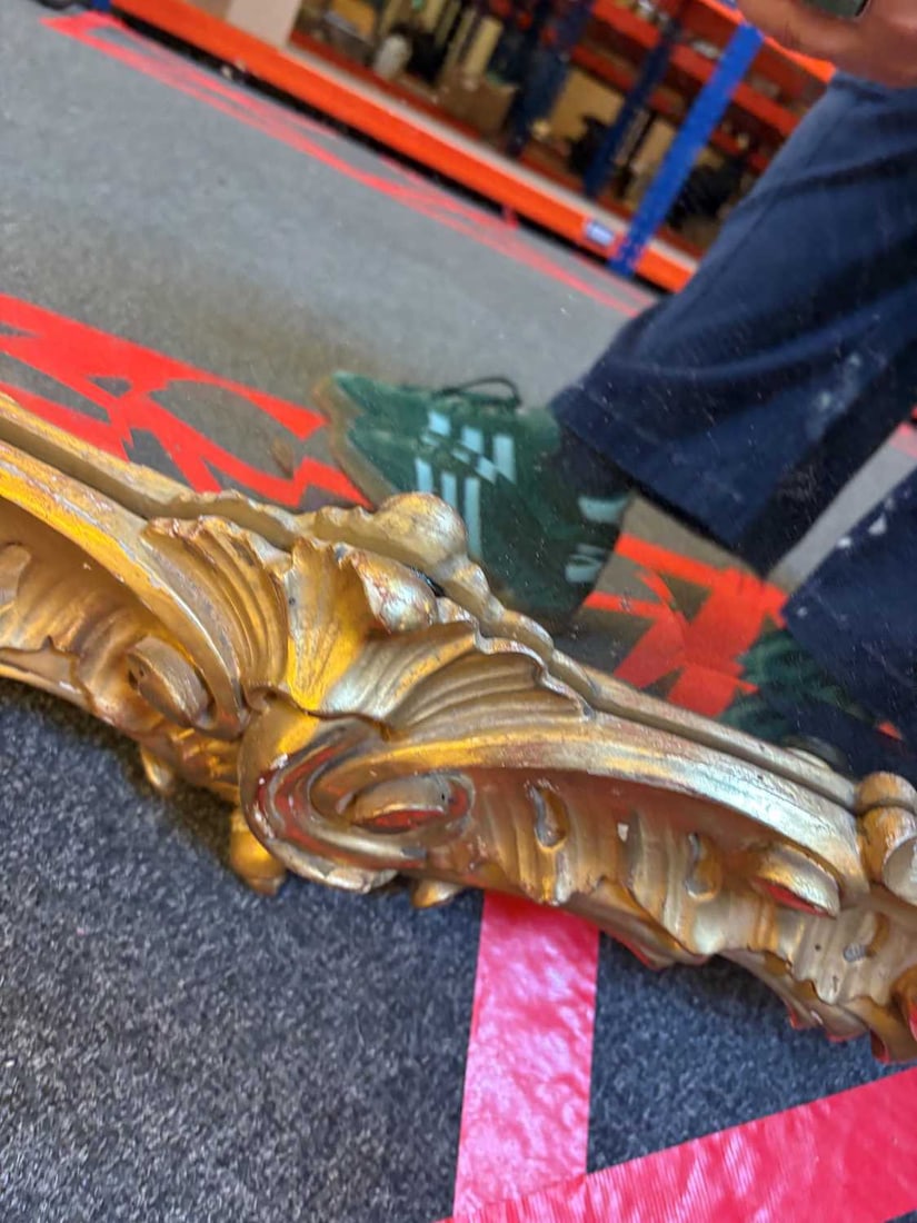 A gilt framed wall mirror, - 11