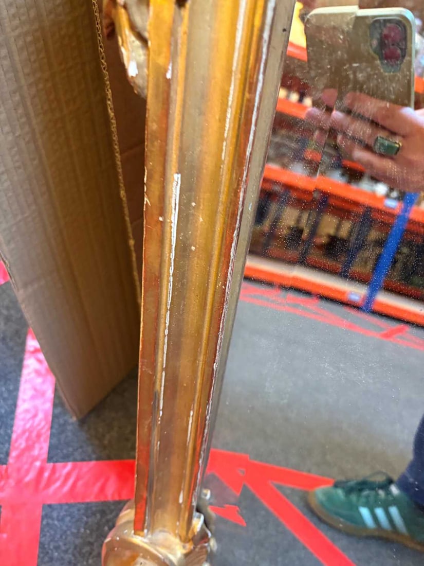 A gilt framed wall mirror, - 13