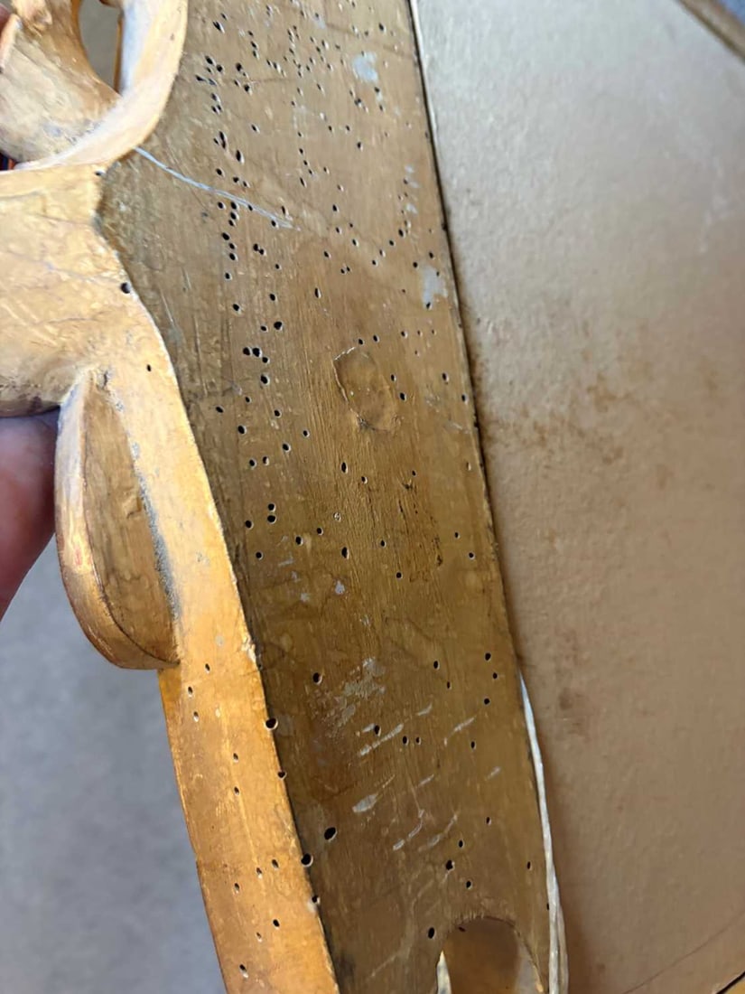 A gilt framed wall mirror, - 14