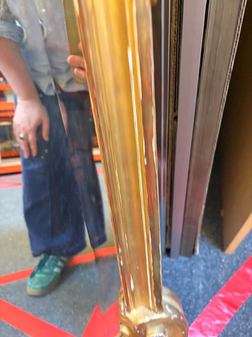 A gilt framed wall mirror, - 15