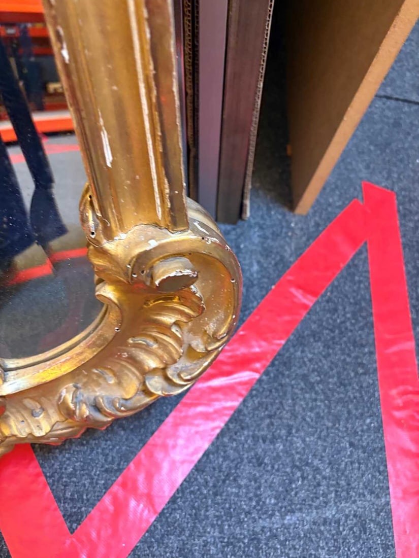 A gilt framed wall mirror, - 9