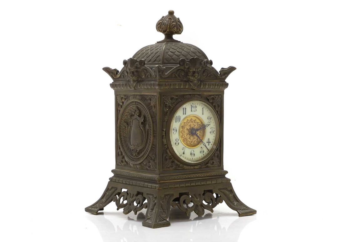 A cast metal mantle clock Late 19th century (1 of 2)