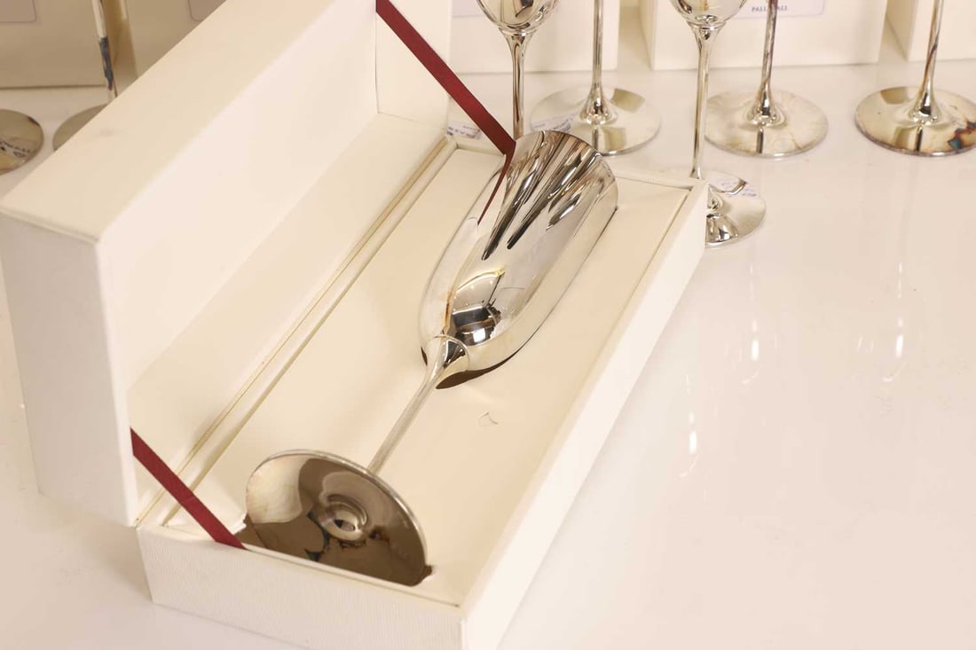 A collection of twelve silver champagne flutes - 2