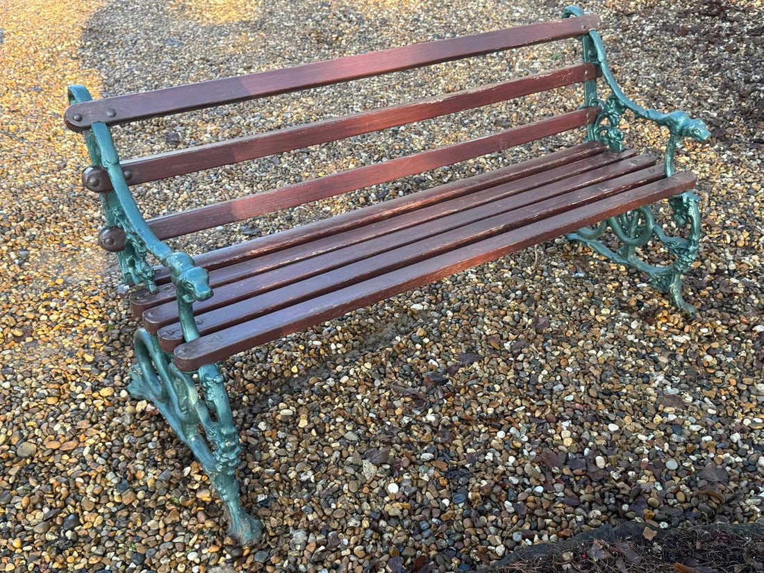 A cast iron and painted garden bench In the Coalbrookdale style, (1 of 1)