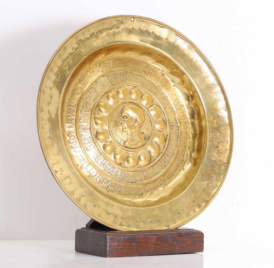 A brass dish/ plaque with classical 'Cicero' medallion 16th century (1 of 2)