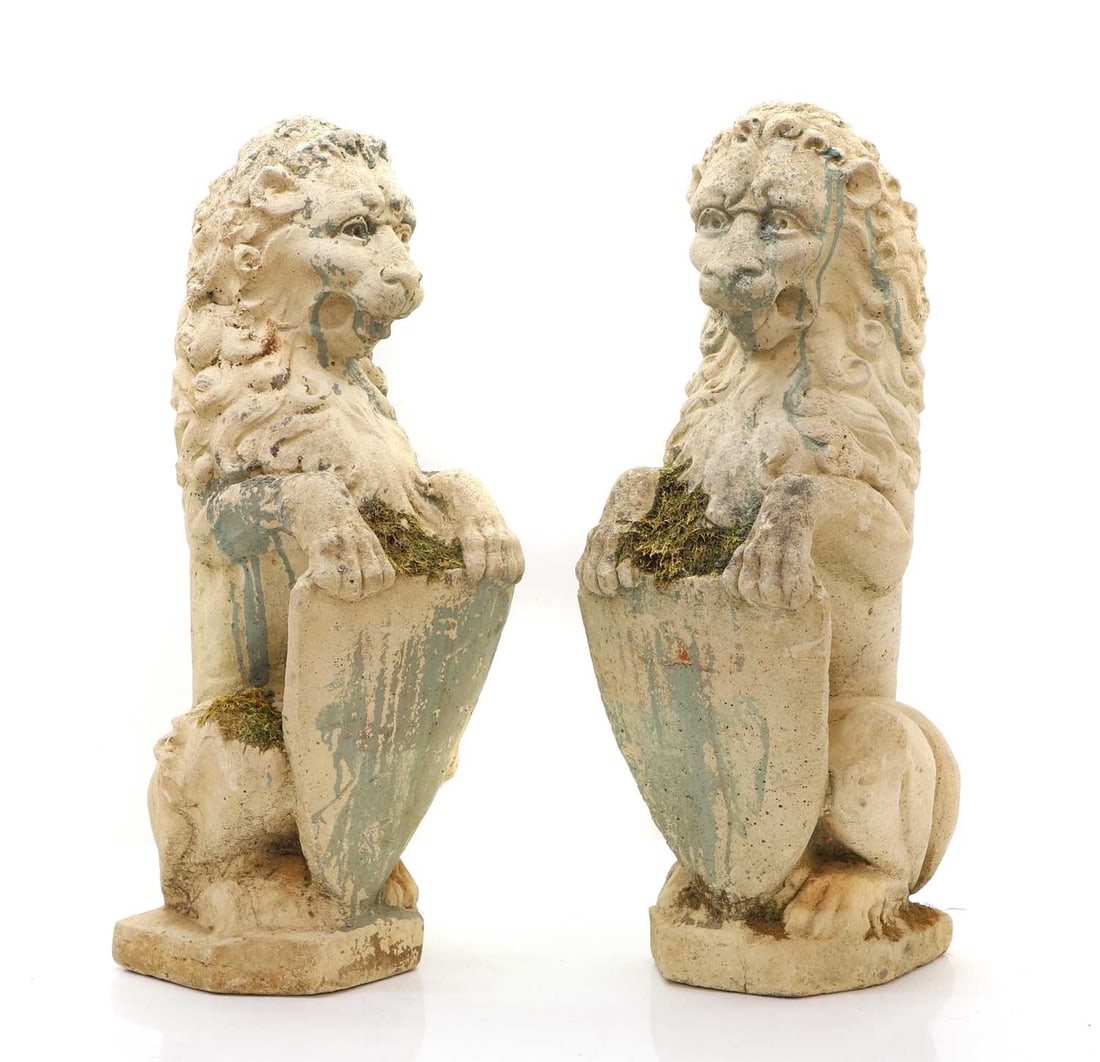 A pair of reconstituted stone armorial lions 20th century (1 of 2)