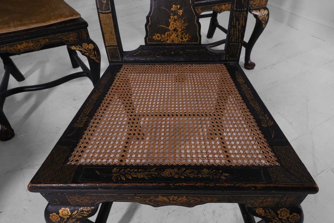 A matched set of six George II black and gilt-japanned dining chairs Second quarter of the 18th cent - 6