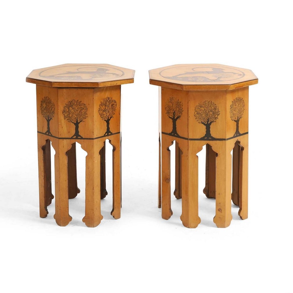 A pair of penwork and inlaid octagonal tables, 20th century, in the manner of Liberty, (1 of 3)