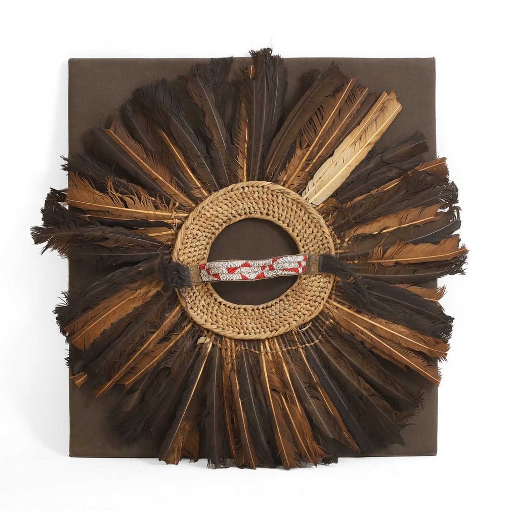 A ceremonial feather and beadwork headdress, 20th century, Papua New Guinea, (1 of 2)