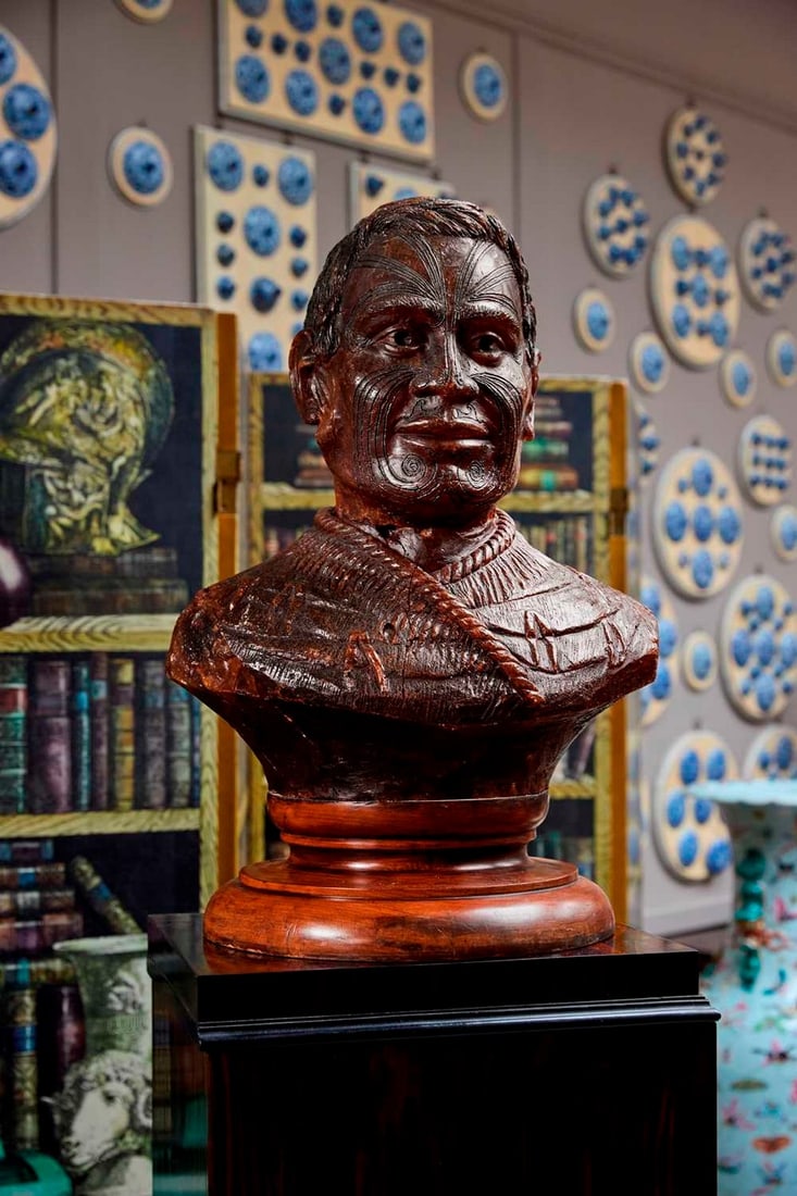 A large carved kauri gum bust of Maori Chief Tamati Tamaiwhakanehua, c.1860, New Zealand,: A large carved kauri gum bust of Maori Chief Tamati Tamaiwhakanehua, c.1860, New Zealand, the life-sized figure carved out of semi-fossilised resin, with moko tattoo to the face and stylised mana dres