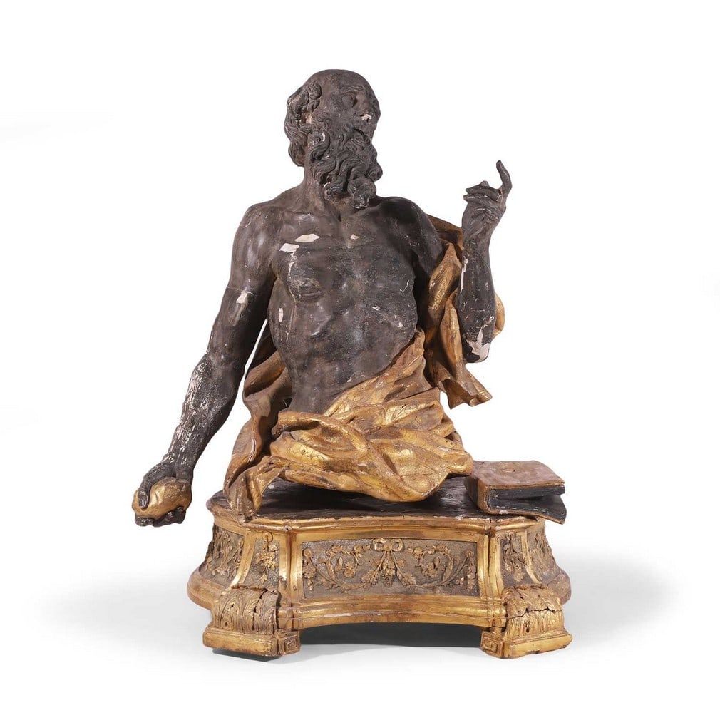 A carved wooden, ebonised and parcel-gilt figure of Saint Jerome, 18th century, Italian, (1 of 9)