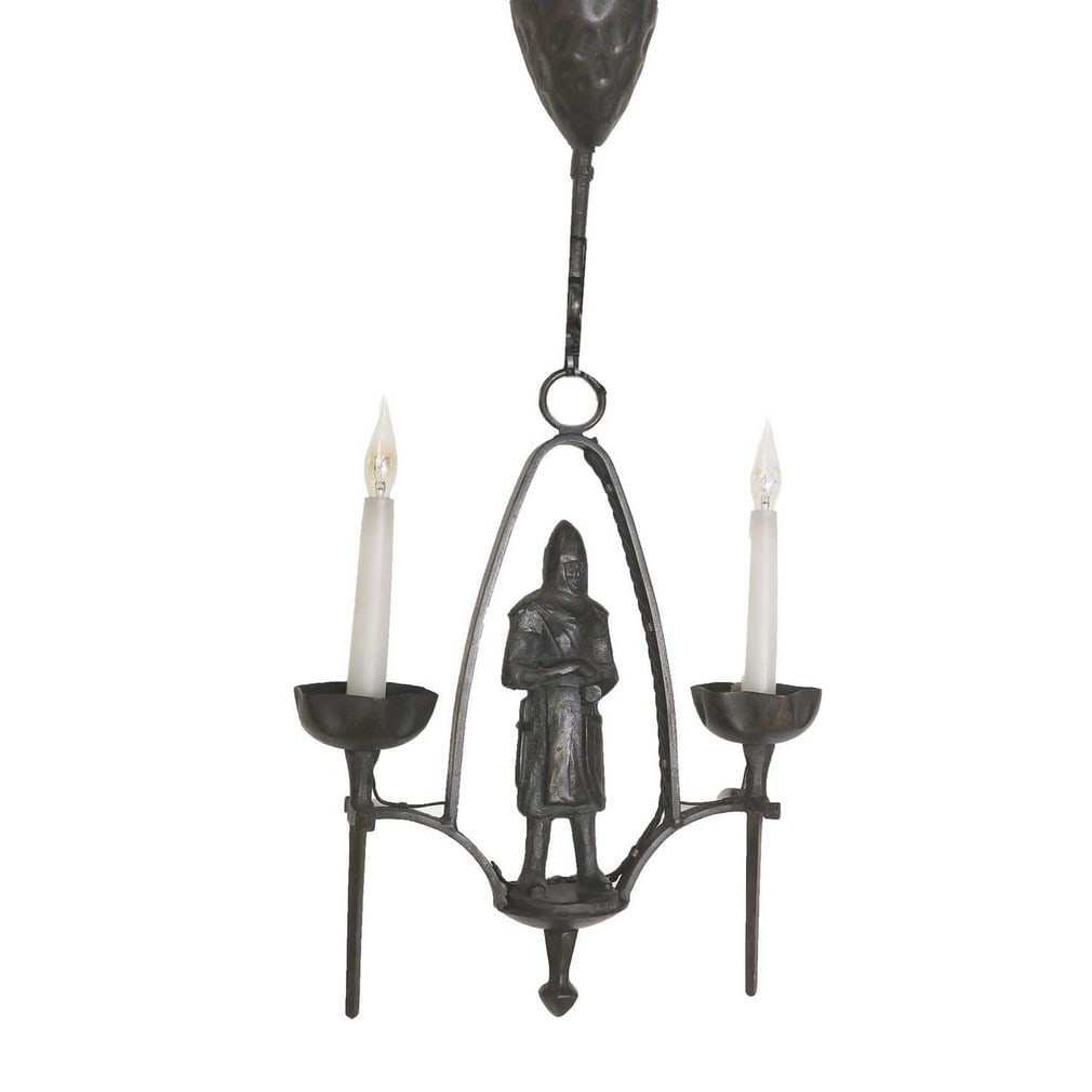 A Gothic Revival wrought-iron light fitting, early 20th century, French,: A Gothic Revival wrought-iron light fitting, early 20th century, French, the twin branches centred by a knight in armour (36cm wide, 10cm deep, 44cm high )