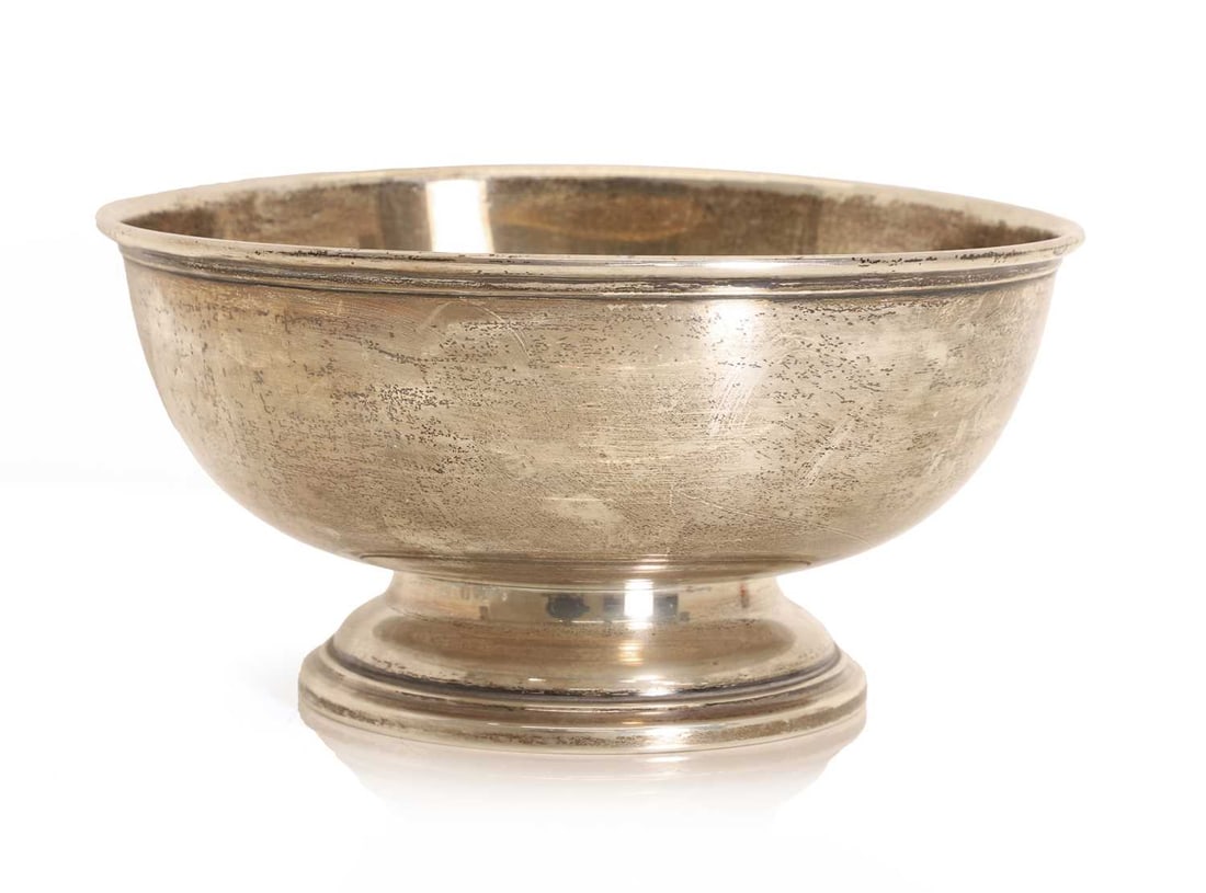 An American sterling silver bowl,: An American sterling silver bowl, 20th century, stamped marks 'Tuttle Sterling 630 and RMN' 23.5cm diameter, 12cm high, 20ozt Condition Report: Tarnished. Some scratches and wear.