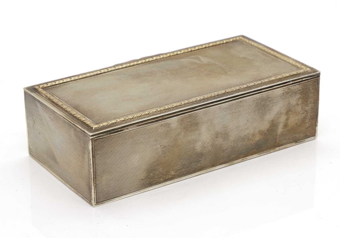 A silver cigarette box, - 3