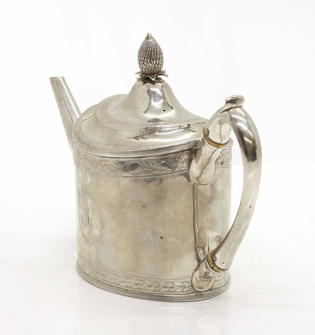 A George silver teapot, - 2
