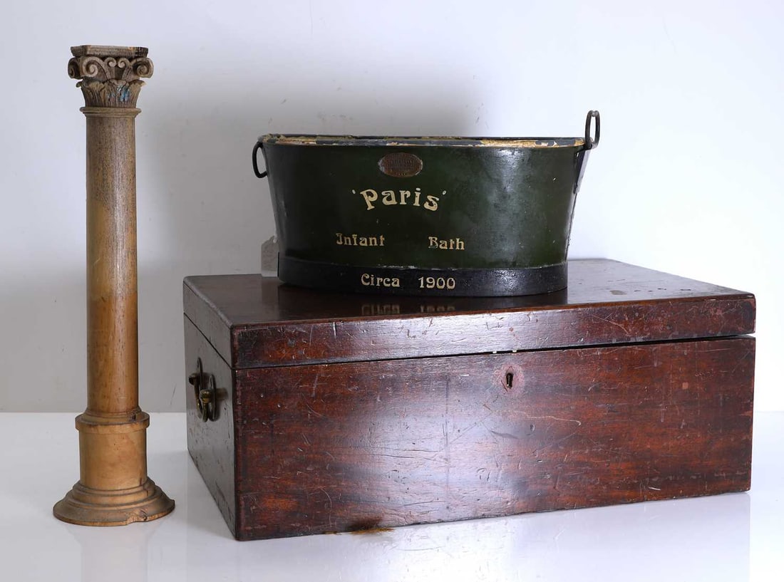 A small green painted toleware bath,: A small green painted toleware bath, The bath inscribed 'Paris, Infant bath, circa 1900', together with a mahogany box and a hardwood Corinthian column, terminating in a circular base mahogany box 54