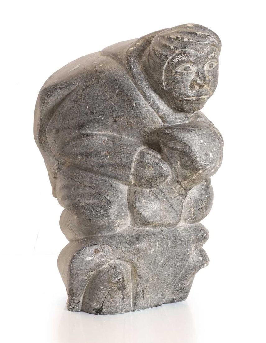 An Inuit carved serpentine figure, First half 20th century, Canadian (1 of 8)