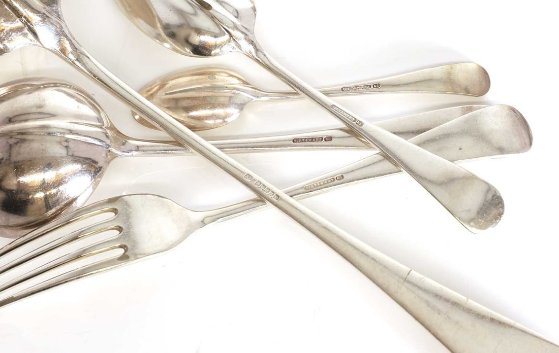 A collection of silver plated rat tail cutlery, - 2