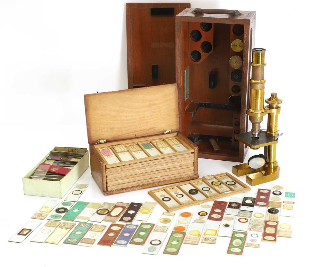A lacquered brass monocular microscope, with two boxes of slides, Circa 1900, by Carl Zeiss, (1 of 3)