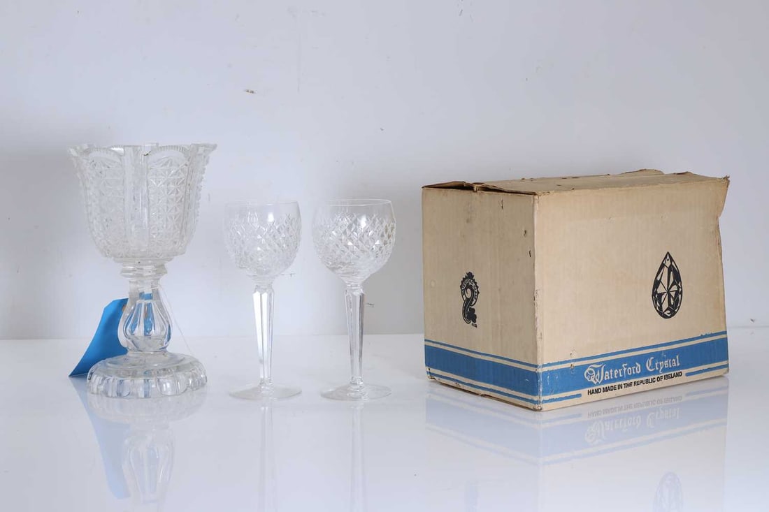 A boxed set of six Waterford hock glasses, 20th century,: A boxed set of six Waterford hock glasses, 20th century, In Alana pattern, stamped to the base, together with a cut glass celery vase Celery vase, 24.5cm high; Glasses, 19cm high7Condition Report: So