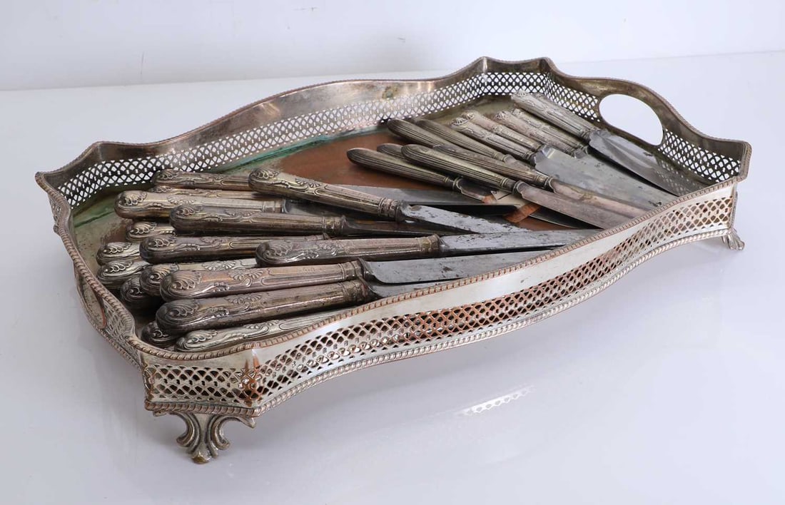 Twenty-two silver handled table knives,: Twenty-two silver handled table knives, The marks worn, the steel blades, stamped GR with a crown, seven further silver handled knives, and six silver handled fish knives table knives, 27.5cm, knives