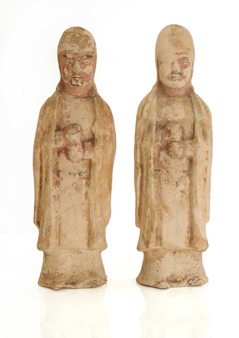 A pair of Chinese pottery attendant figures, Tang Dynasty, (1 of 4)