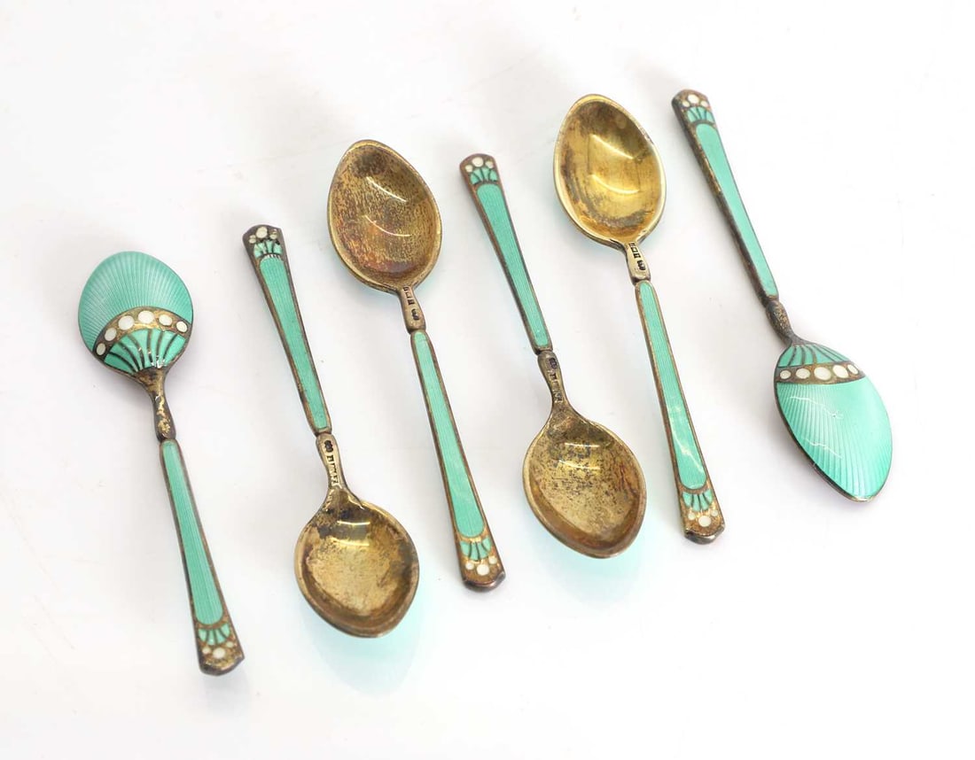 A set of six silver and enamelled coffee spoons,: A set of six silver and enamelled coffee spoons, By Turner & Simpson, Birmingham, 1955, in a fitted case, 7.5cm long7Condition Report: Tarnished.