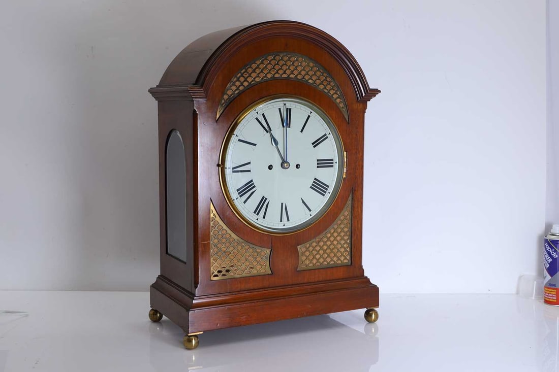 A mahogany cased mantle clock, 20th century, (1 of 2)