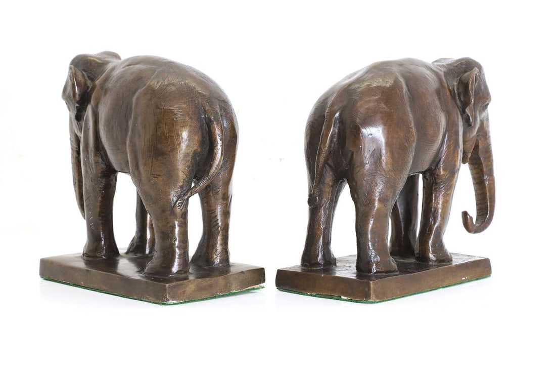A pair of bronze bookends, 20th century - 2