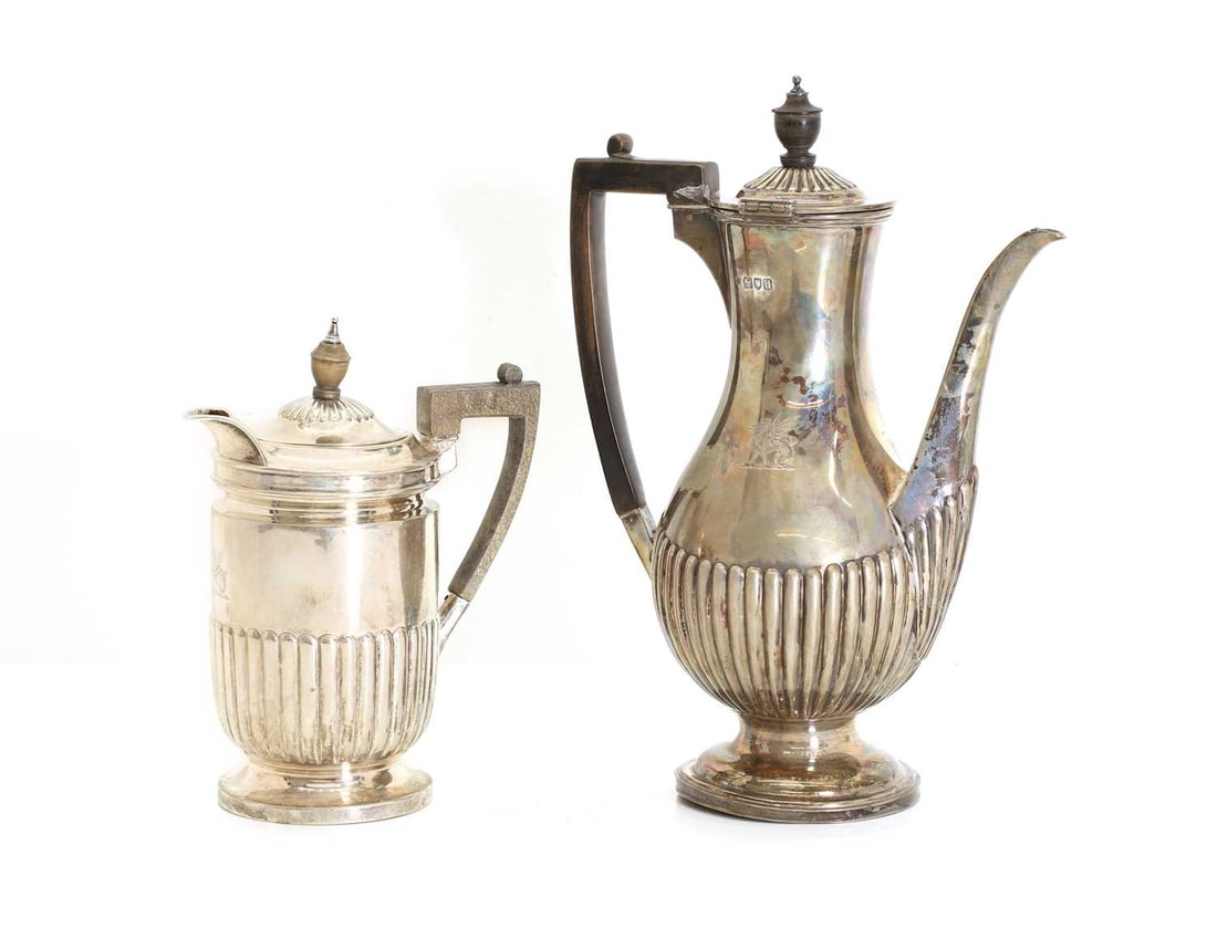 A silver coffee pot and hot water jug, - 2