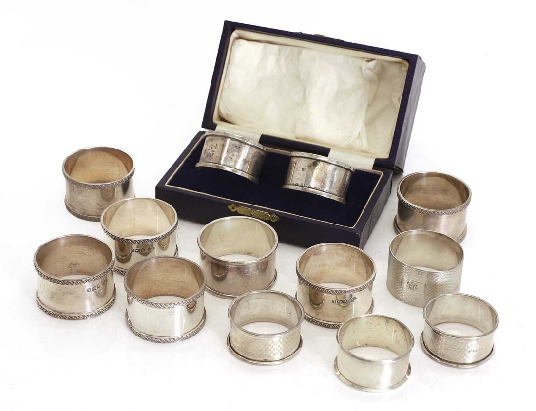A collection of thirteen silver napkin rings (1 of 2)