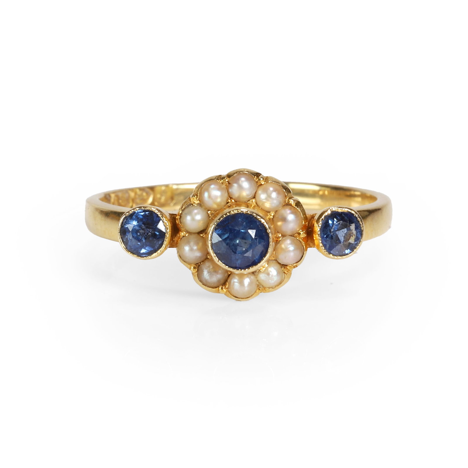 An Edwardian 18ct gold sapphire and split pearl ring, (1 of 3)