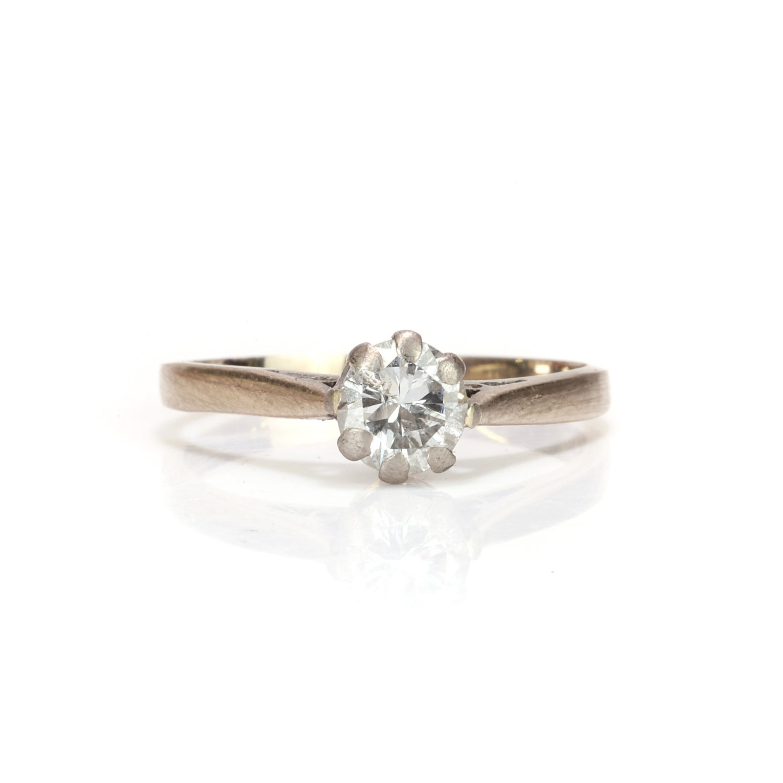 An 18ct gold single stone diamond ring, (1 of 3)
